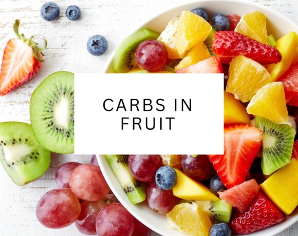 A bowl of fruit showcasing a variety of low carb fruits.