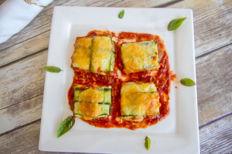 zucchini parcels in a tomato sauce