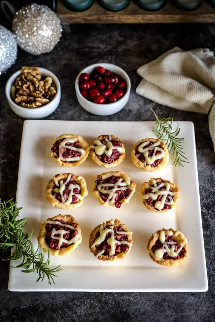 cranberry walnut mini tarts in a coconut flour pastry.