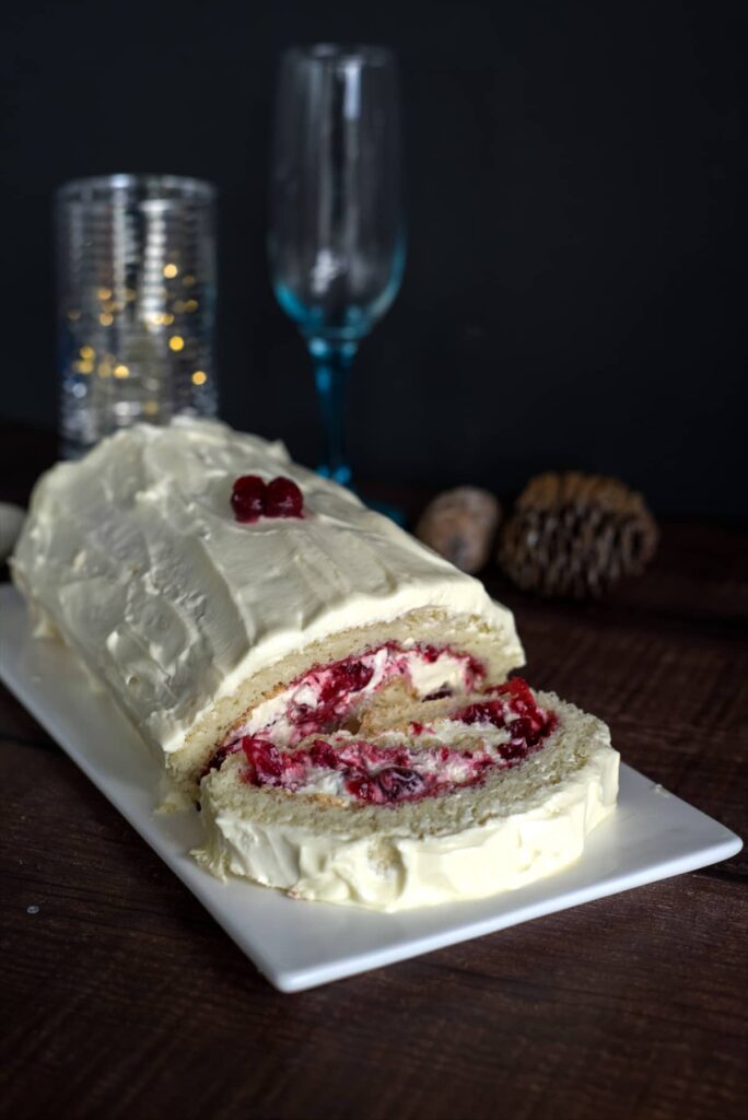 white yule log with cranberries