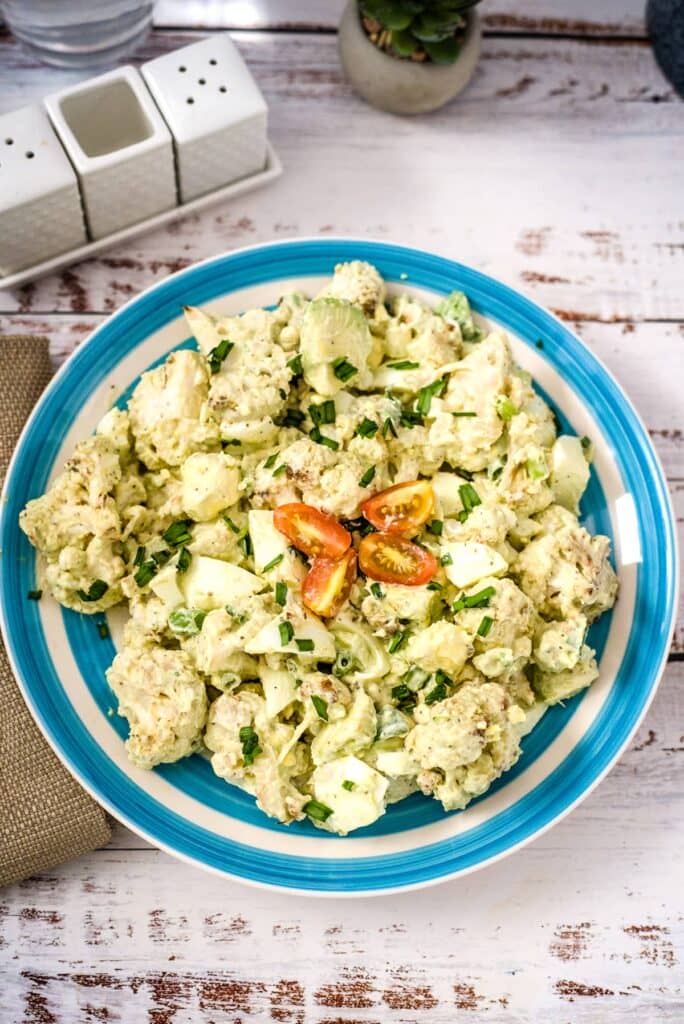 cauliflower salad on a plate with tomatoes and eggs