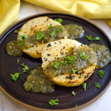 celeriac steak on a plate with sauce