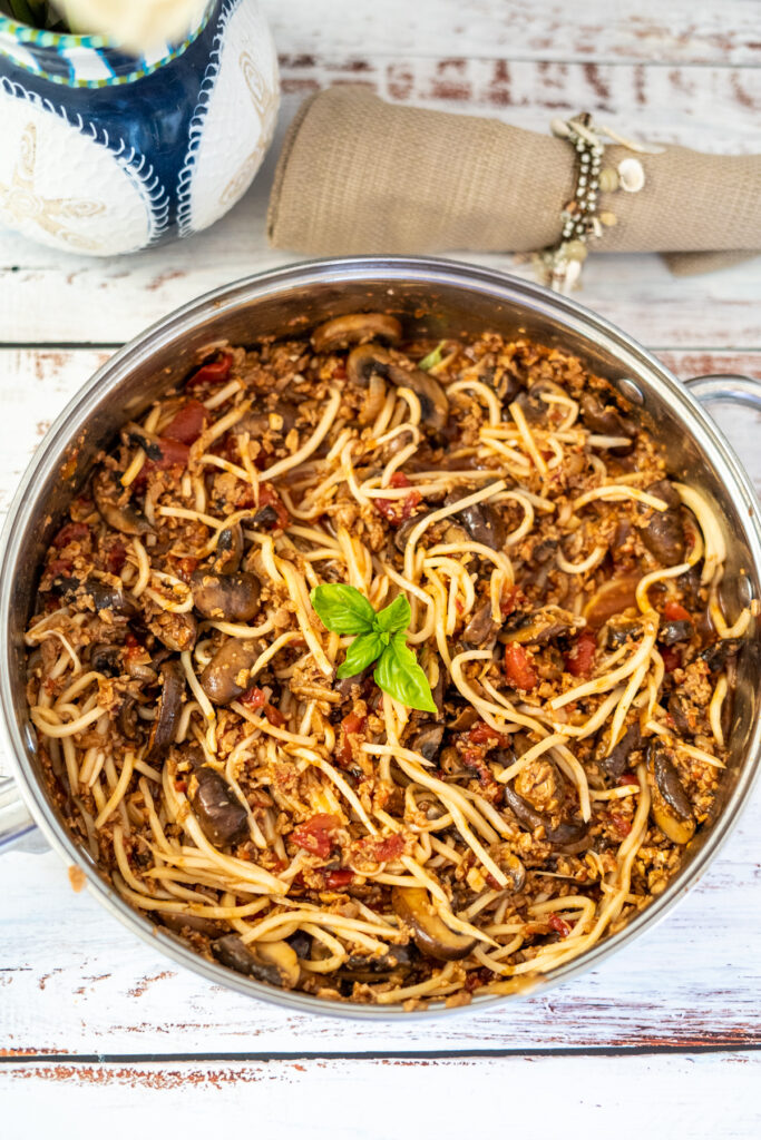 vegan bolognese with noodles in a pan