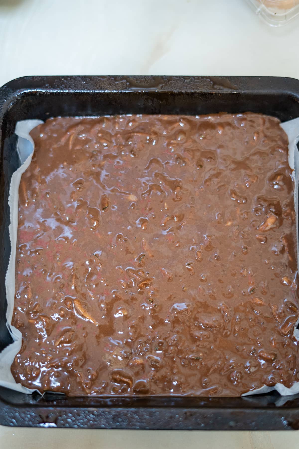 brownie mixture in tin