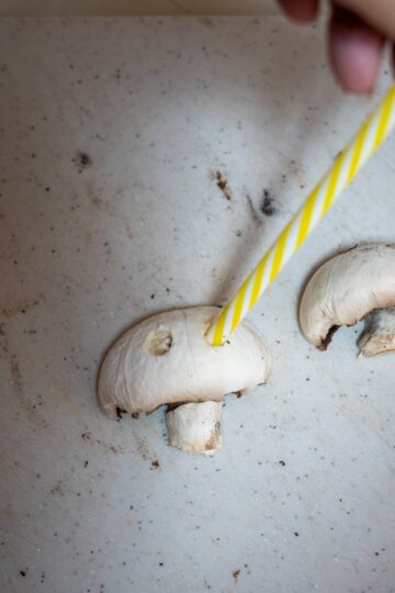 carved eyes in mushrooms