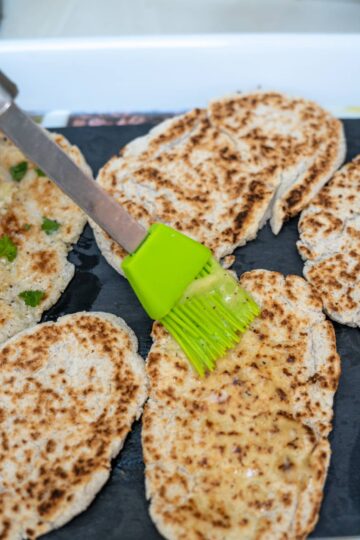 brush bread with garlic butter