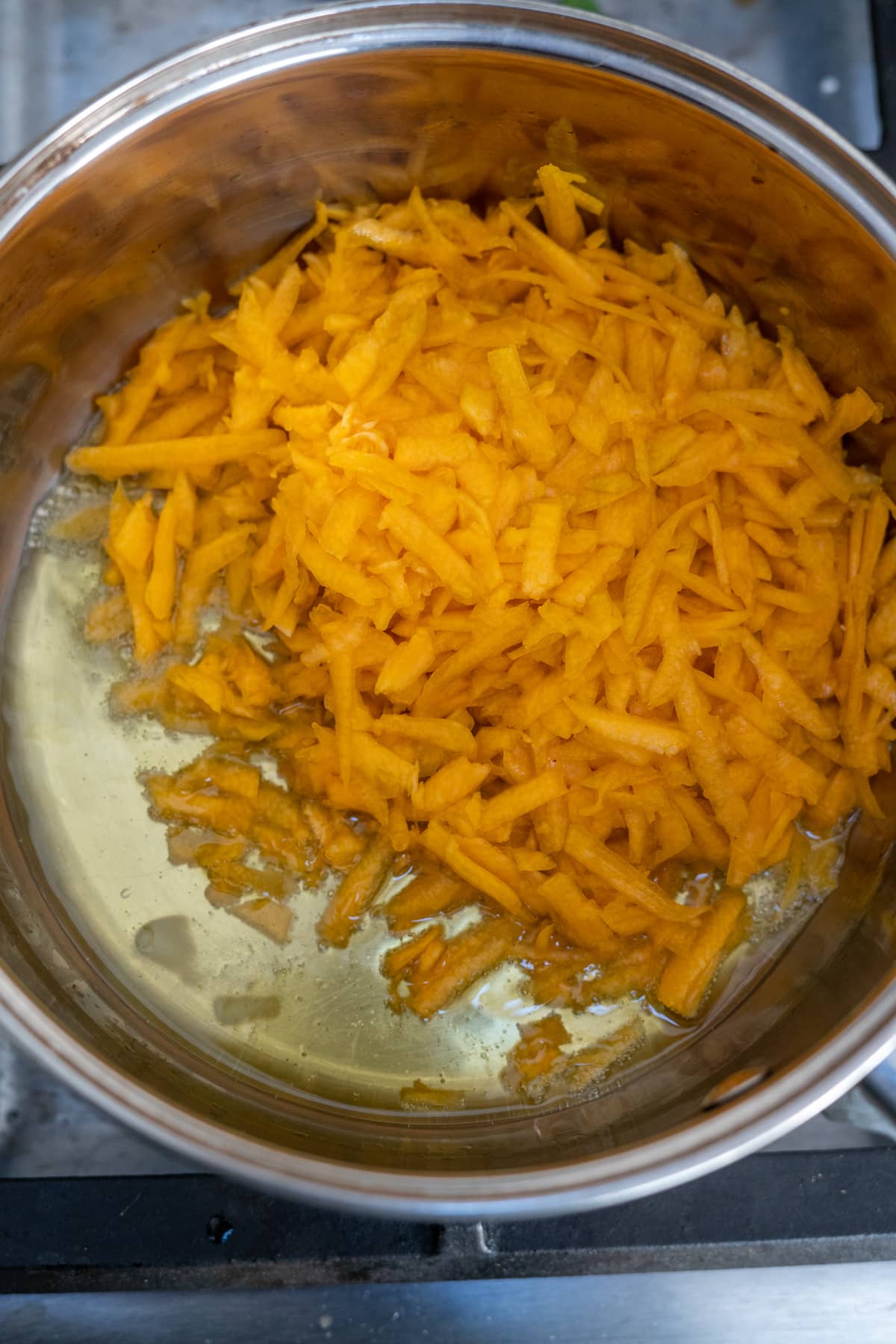 grated pumpkin in pan