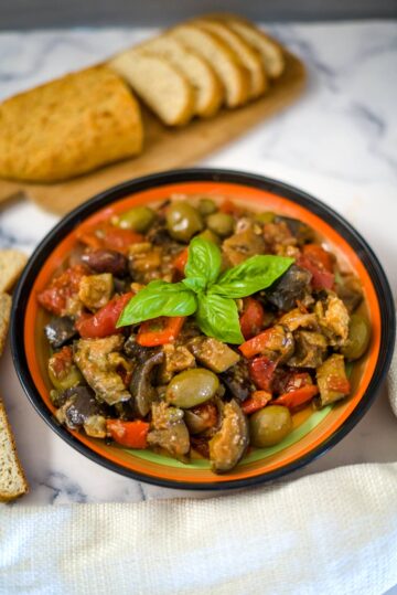 eggplant and vegetables in a dish.