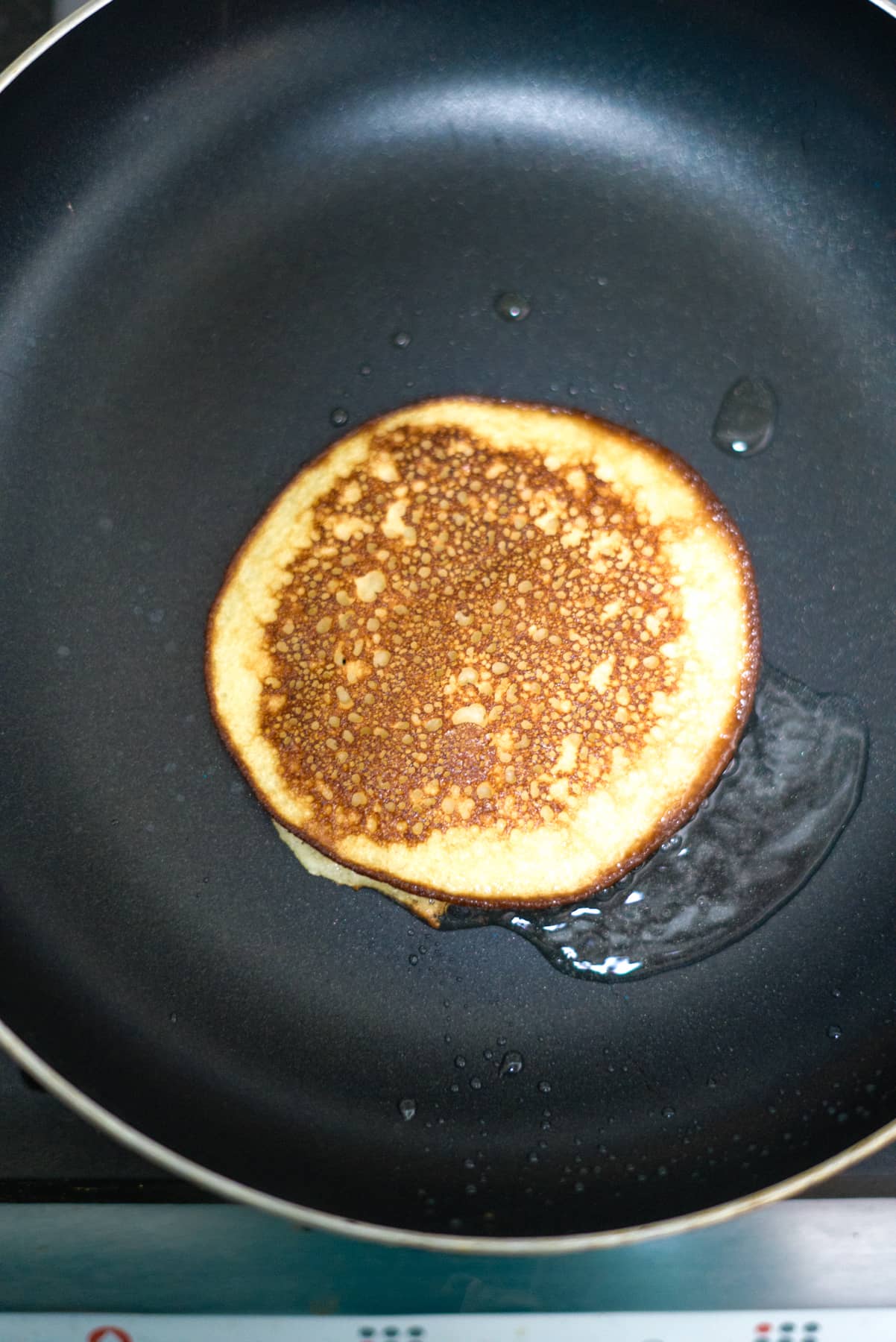 almond flour pancake in pan