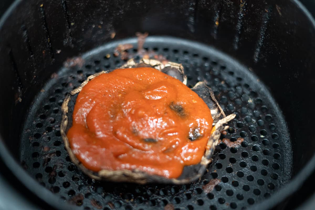 marinara sauce on mushroom