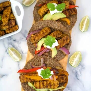 vegan tempeh fajitas on a board