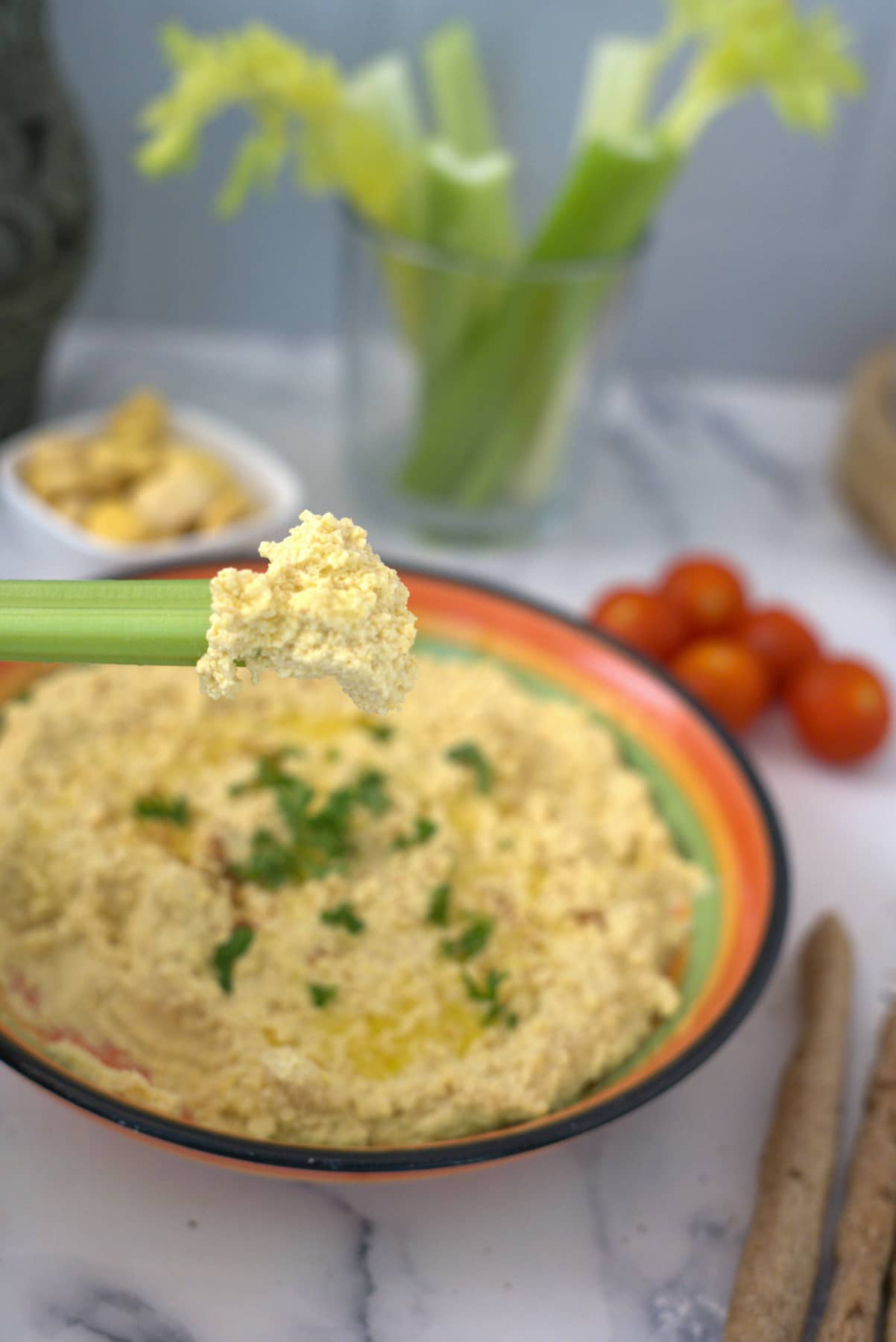 celery stick in hummus