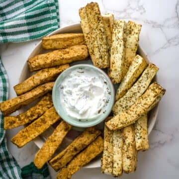 a plate full of paneer fries.