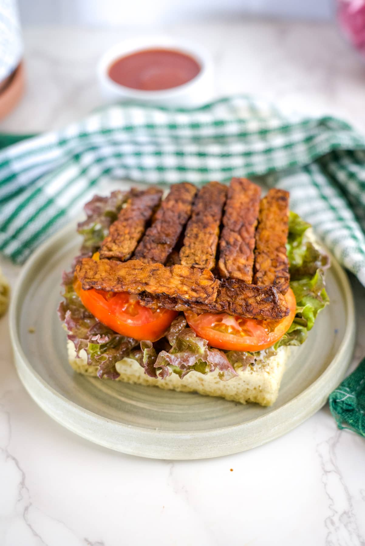 fakin bacon tempeh blt on a plate