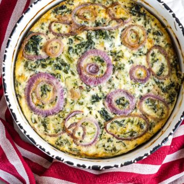 quiche with onions in dish.