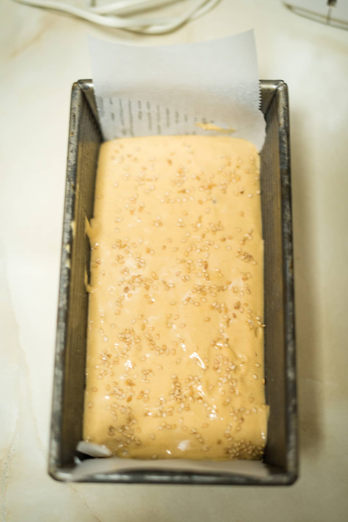 tahini mixture in bread loaf tin
