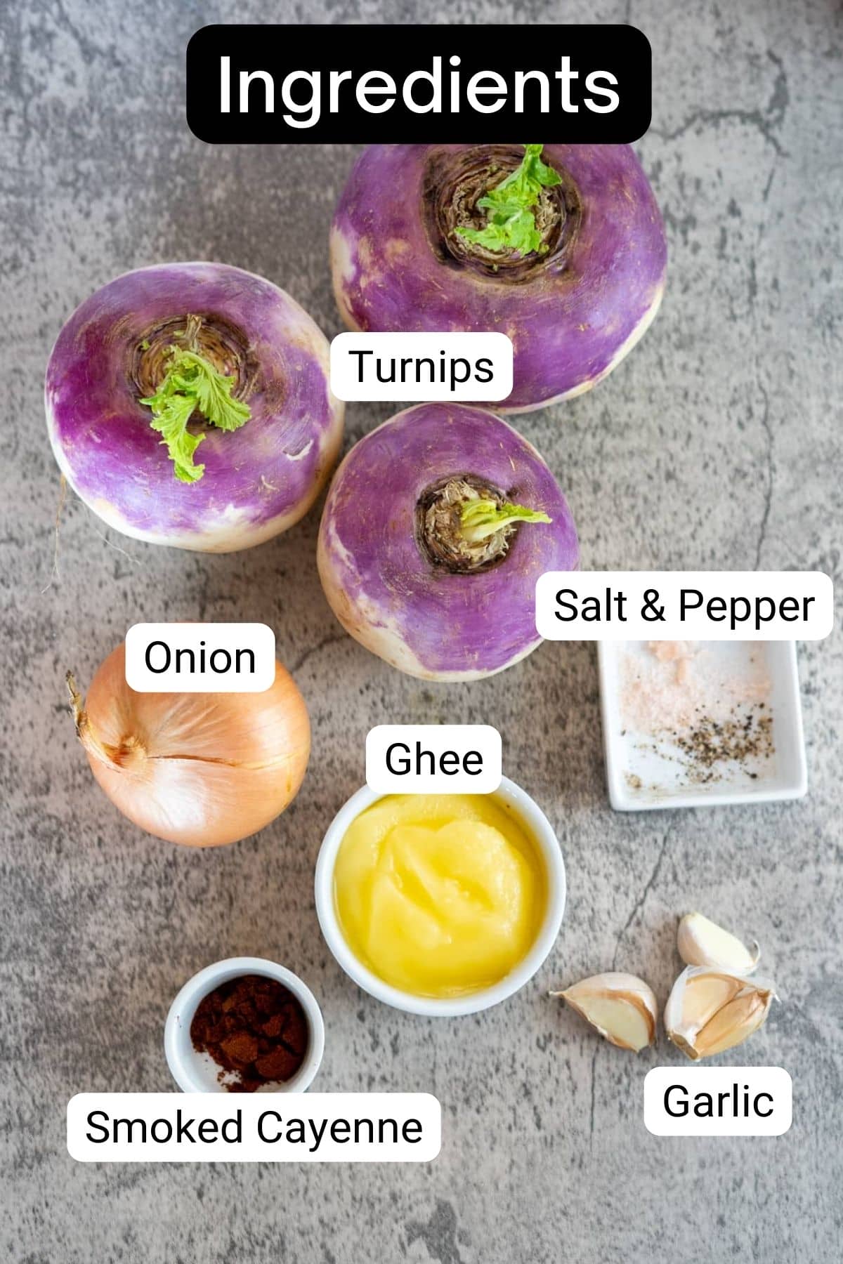 Ingredients for fried turnips on a grey background.