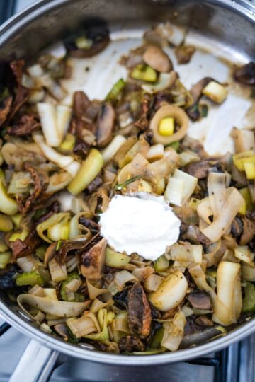 Sauteed mushrooms with a creamy sour cream topping.